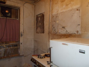 Collapsing ceilings and exposed electrical wiring were threatening tenant safety.