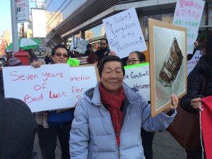 Tenant leader Ms. Song marching for tenant safety and affordable housing